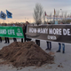 Environmental activists dump horse manure outside the United Nations climate summit Saturday to subtlety signal these talks are horseshit.